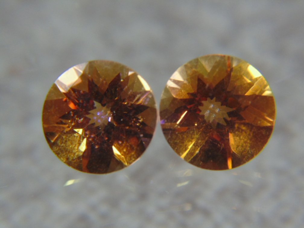 A pair of round Mystic Topaz