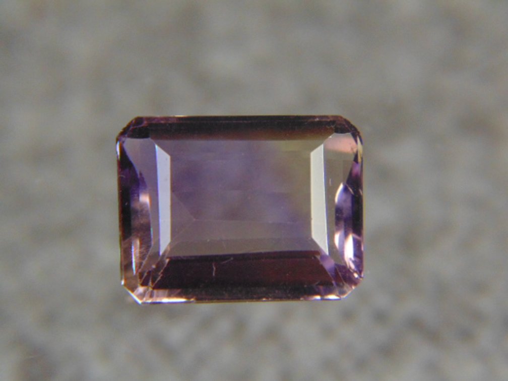 A cushion cut Ametrine