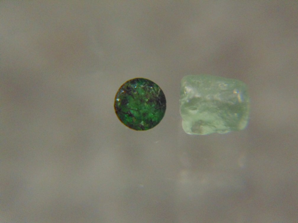 A rough and faceted Emerald from Brazil