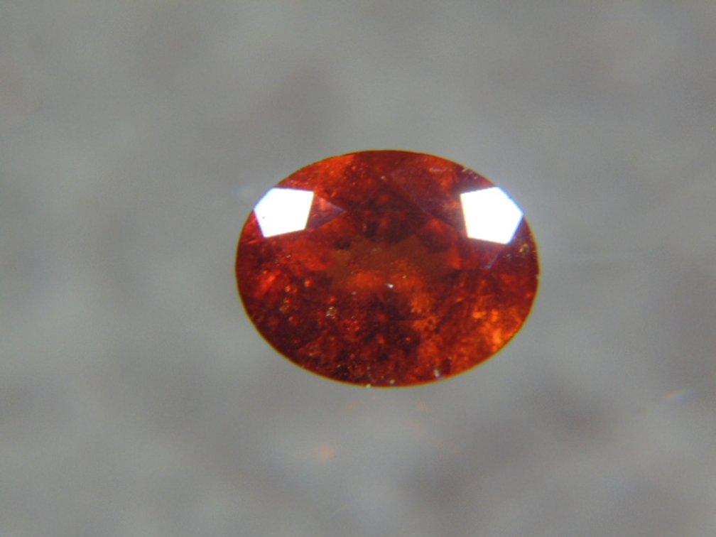 A 9 x 7 mm emerald cut Hessonite Garnet, 1.75 cts