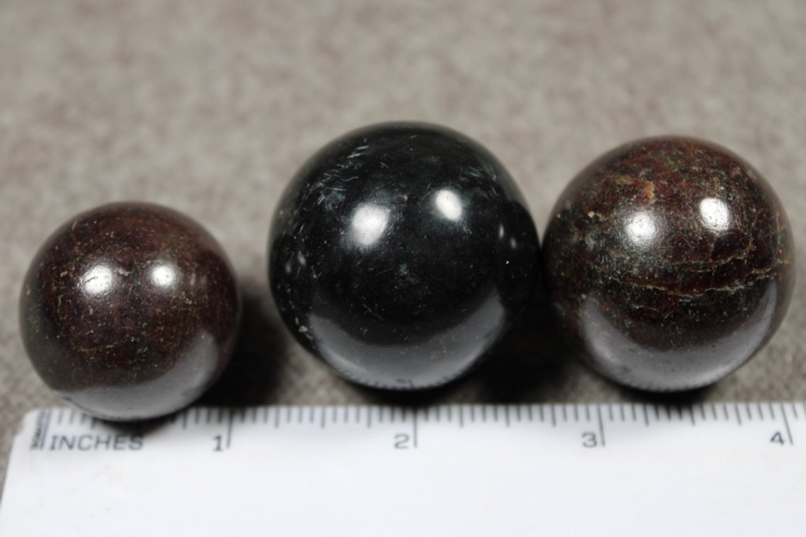 Three Garnet spheres, 7.6 ozs
