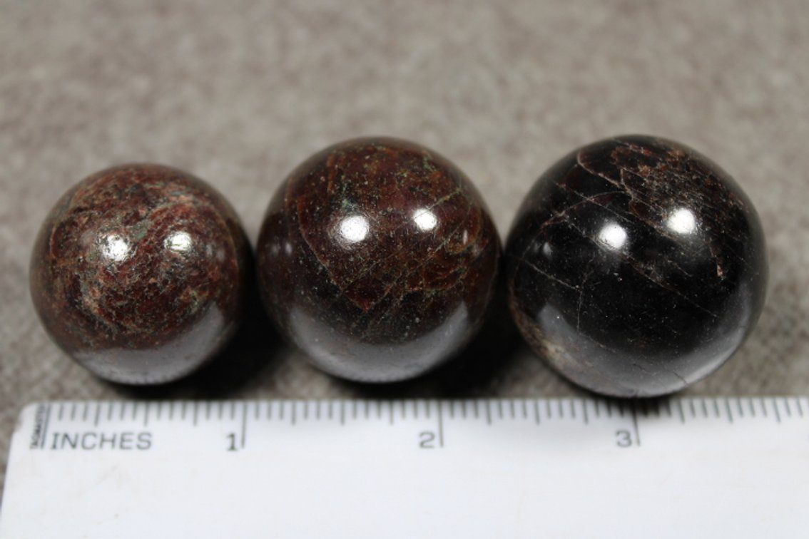 Three Garnet spheres, 7.1 ozs