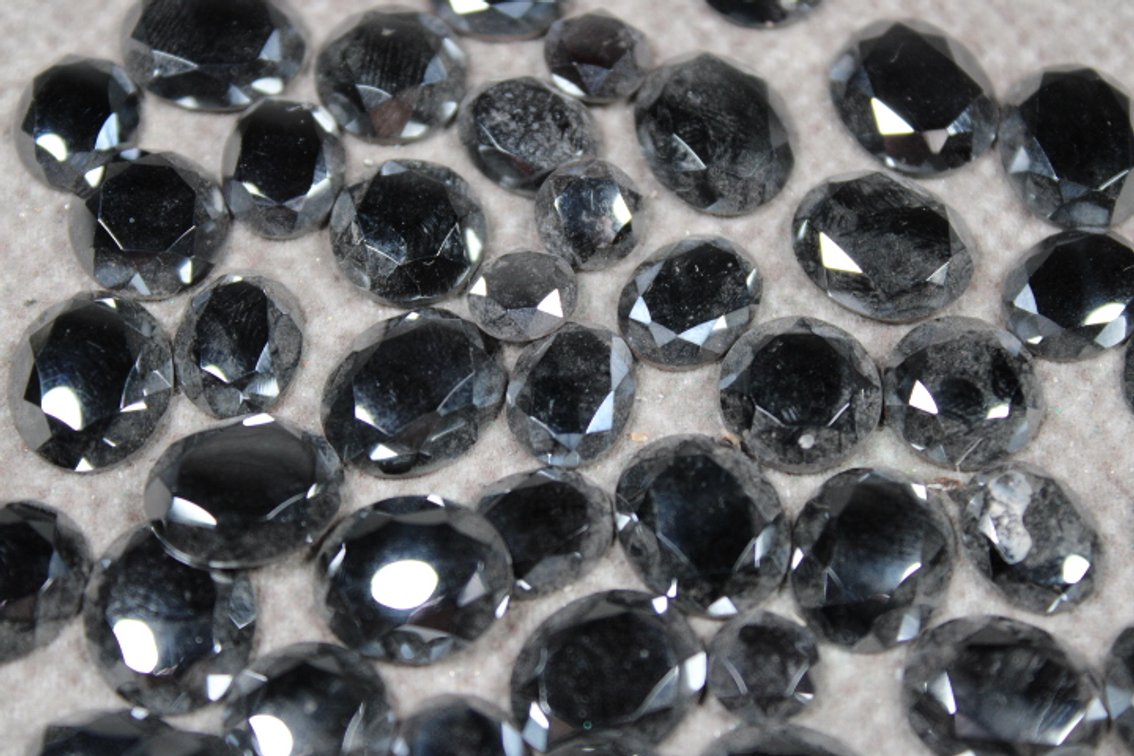 Several faceted Hematite cabs