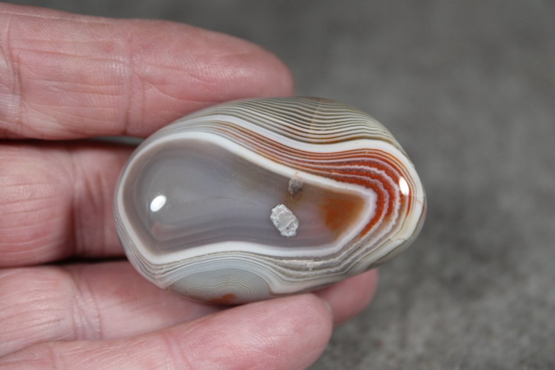A 1 oz tumbled polished Lake Superior Agate