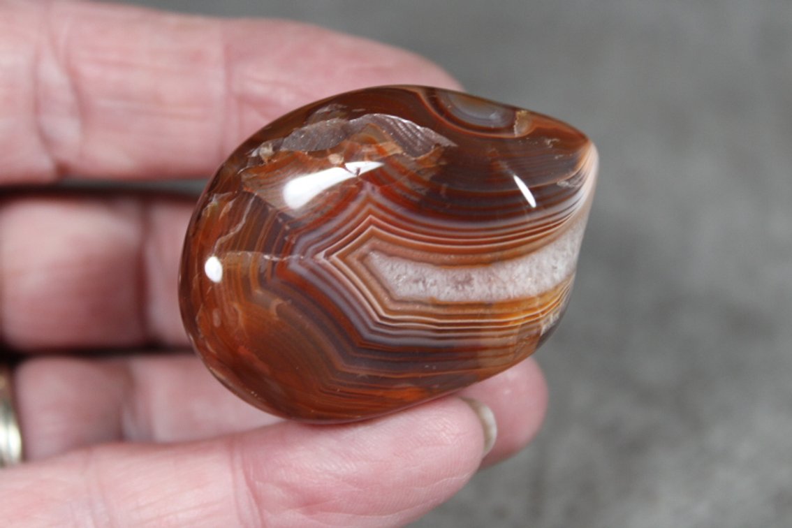 A 1.5 oz tumbled polished Lake Superior Agate with eyes