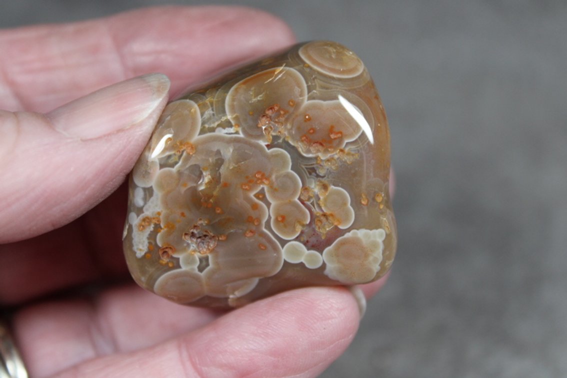 A 1.2 oz tumbled polished Lake Superior Agate with eyes