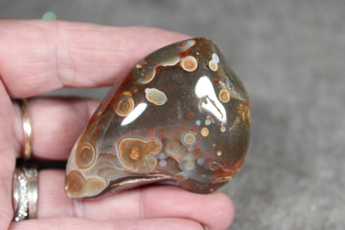 A 2.1 oz tumbled polished Lake Superior Agate with eyes