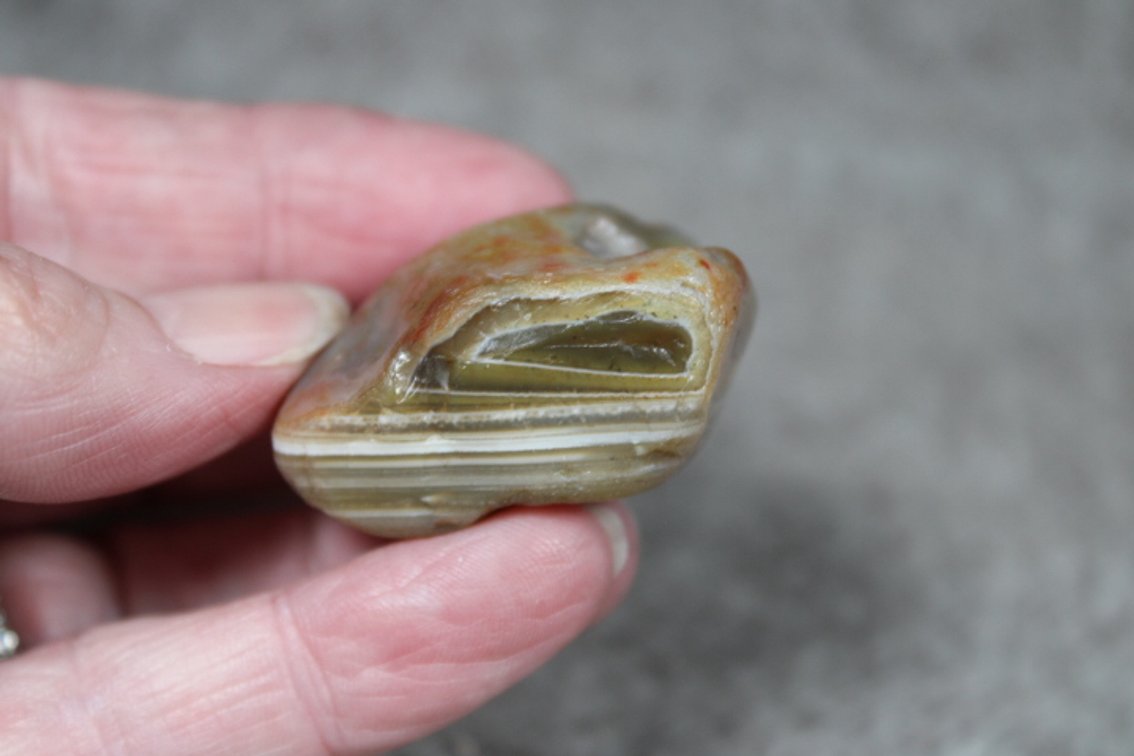 A natural .9 oz Lake Superior Agate with waterlevel banding