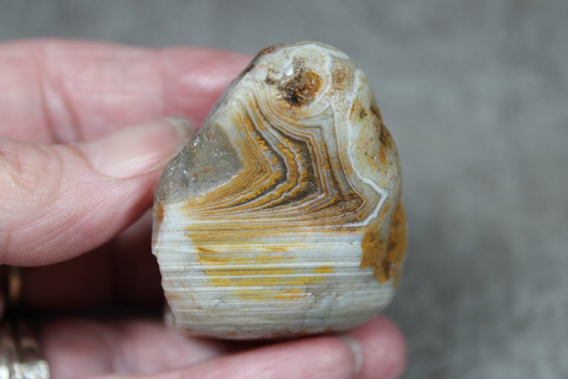 A natural 2.4 oz Lake Superior Agate with waterlevel banding