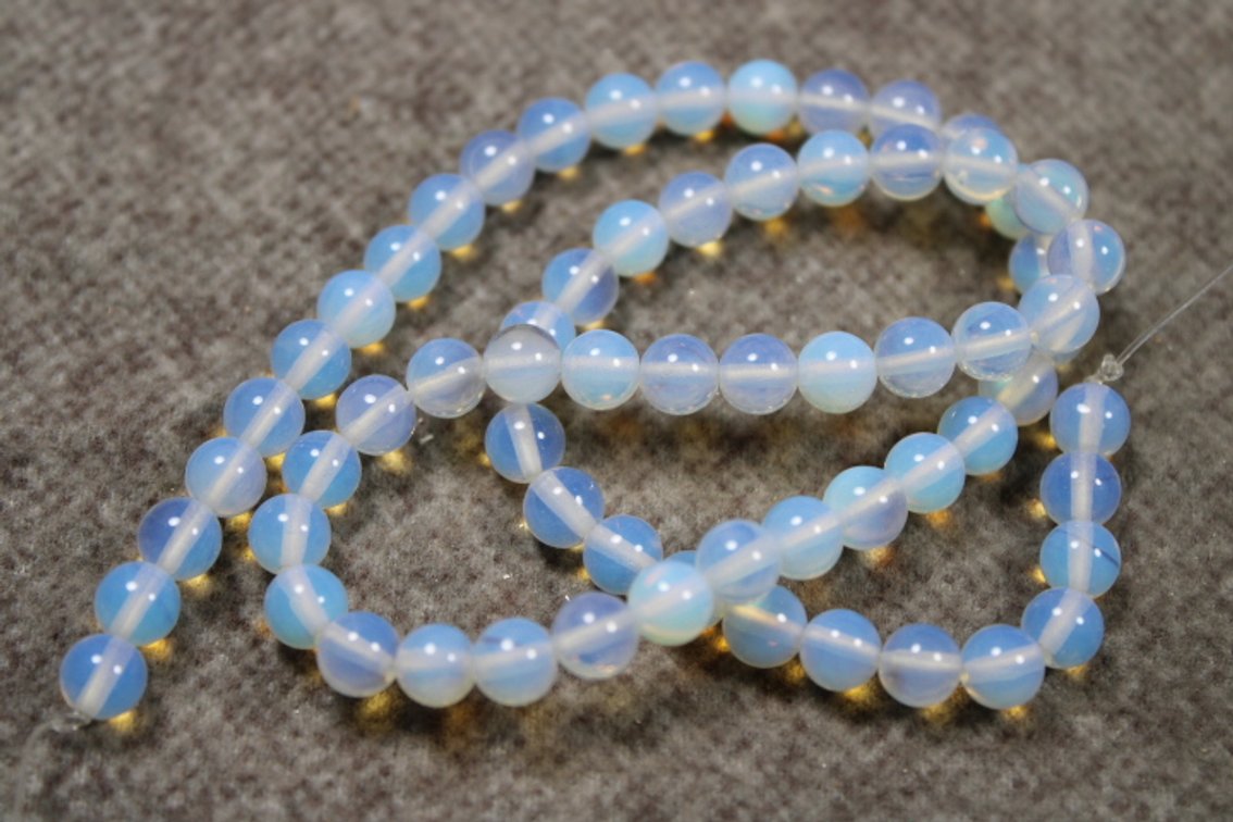 A strand of 15" Opalite beads