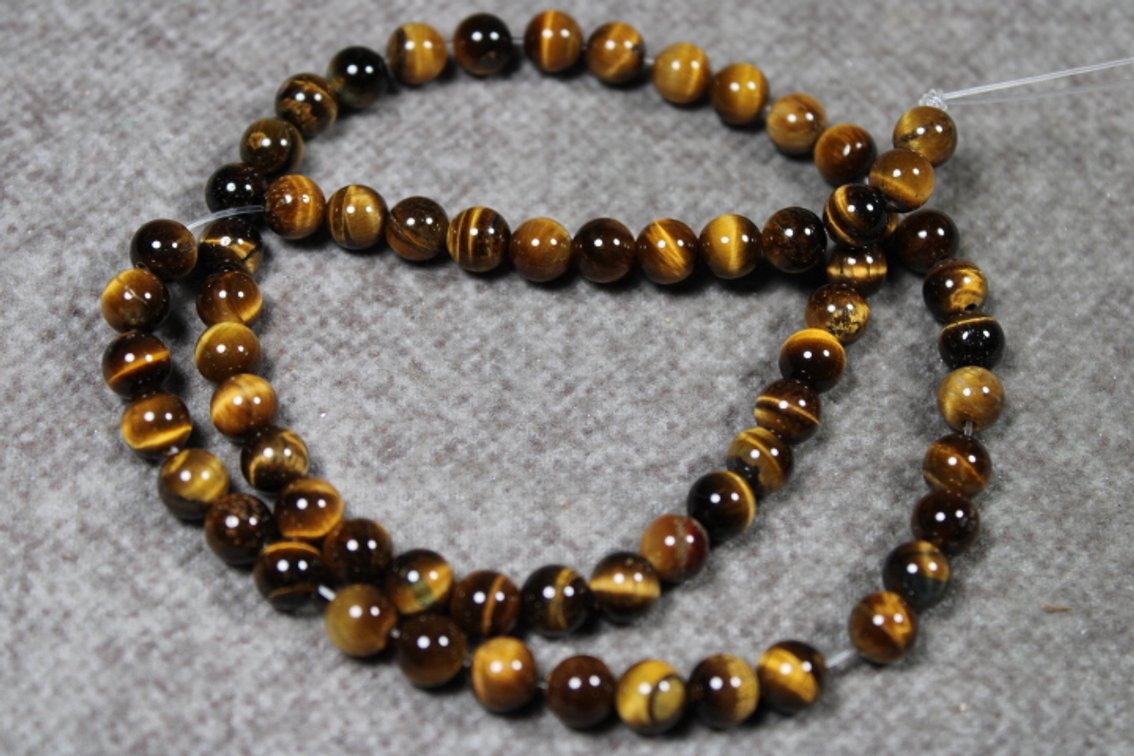 A 15" strand of Tiger Eye beads