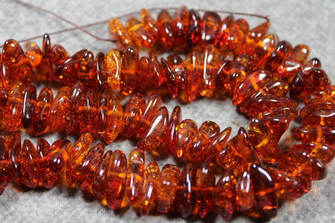 A strand of 16" Amber chip beads