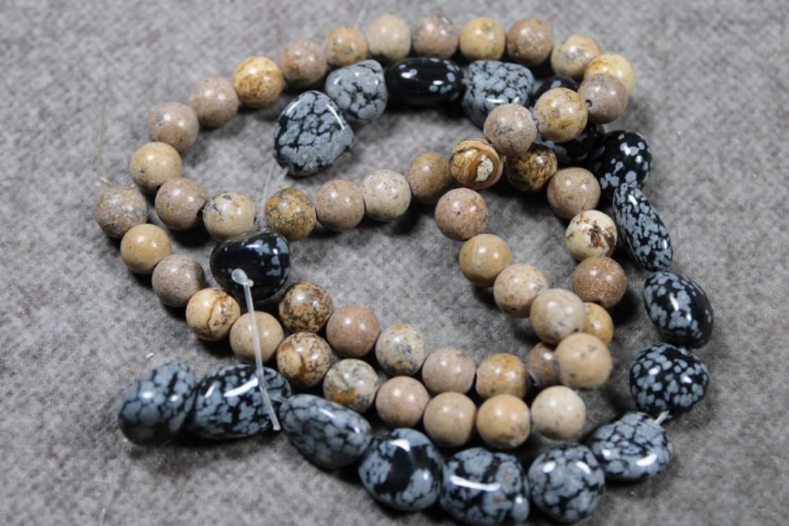 A strand of 15 1/2" Picture Jasper beads and a strand of 8" Snowflake Obsidian beads