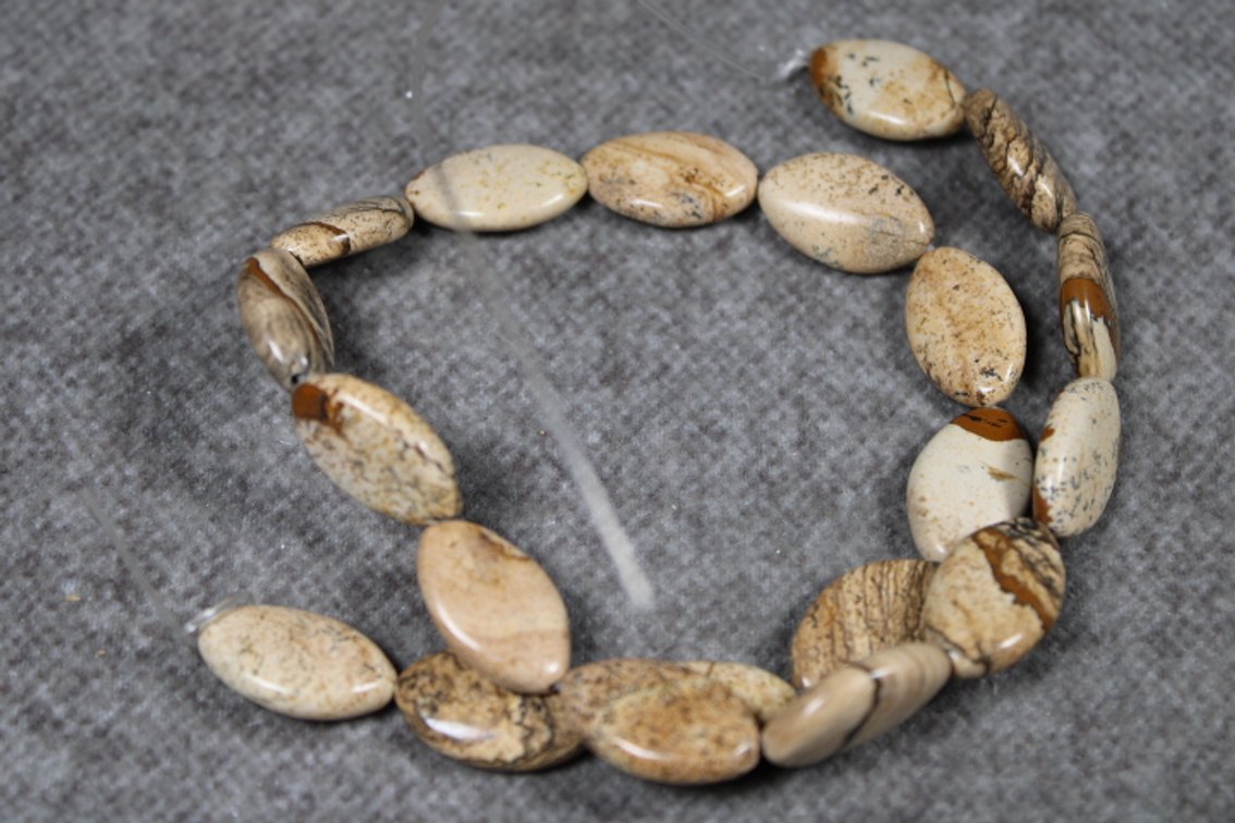 A 15" strand of Picture Jasper beads