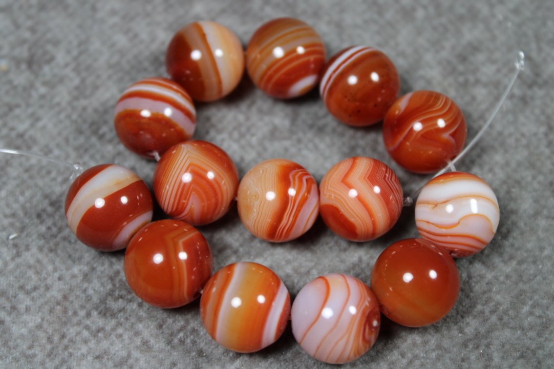 A 7 1/2" strand of Brazilian Agate beads