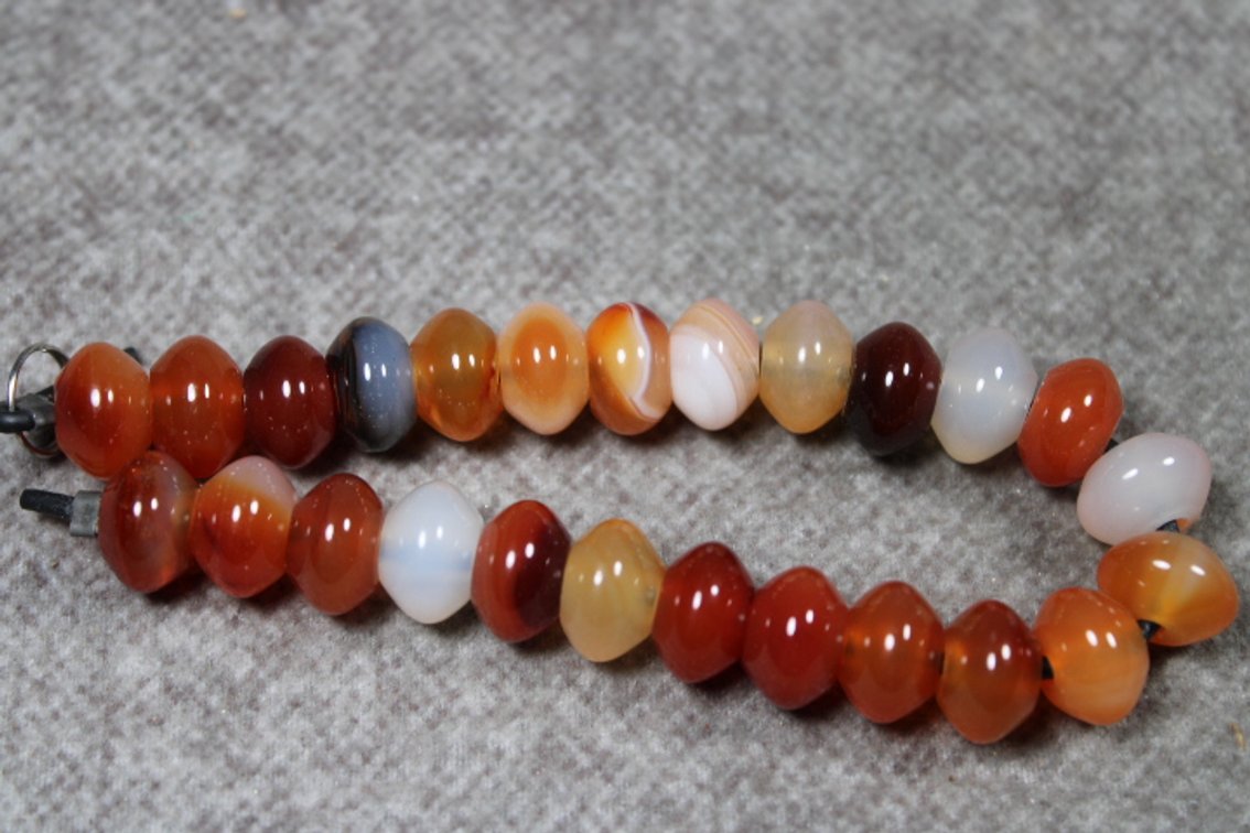 A 8" strand of Brazilian Agate beads