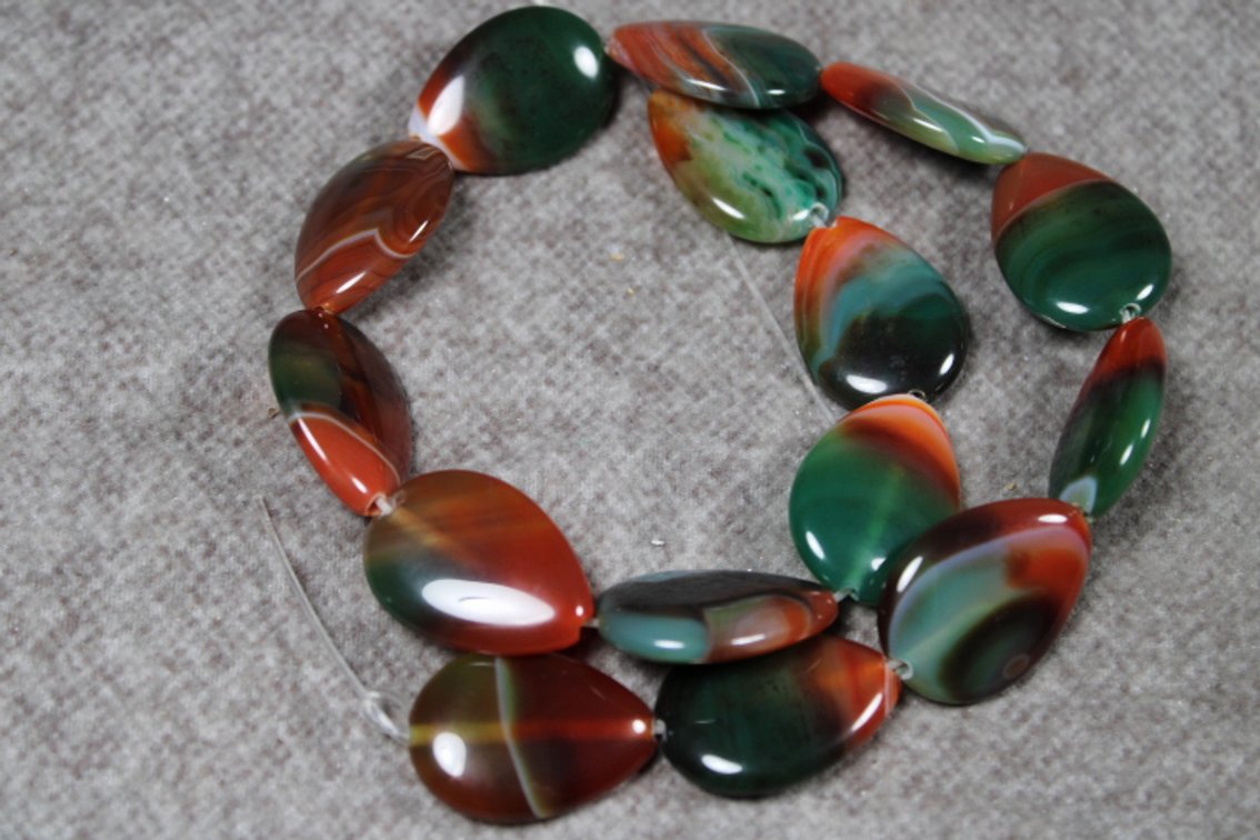 A 14" strand of Brazilian Agate beads