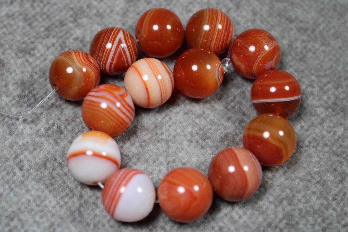 A 7" strand of Brazilian Agate beads