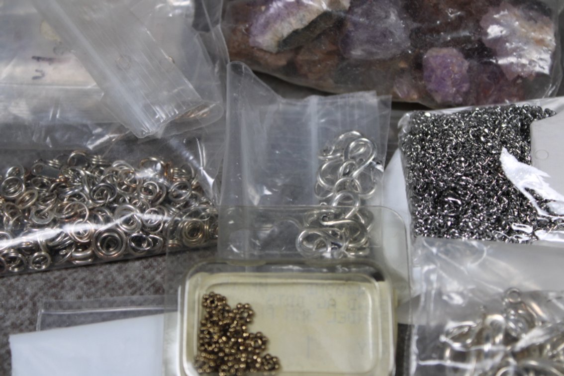 An assortment of findings and a rough Amethyst