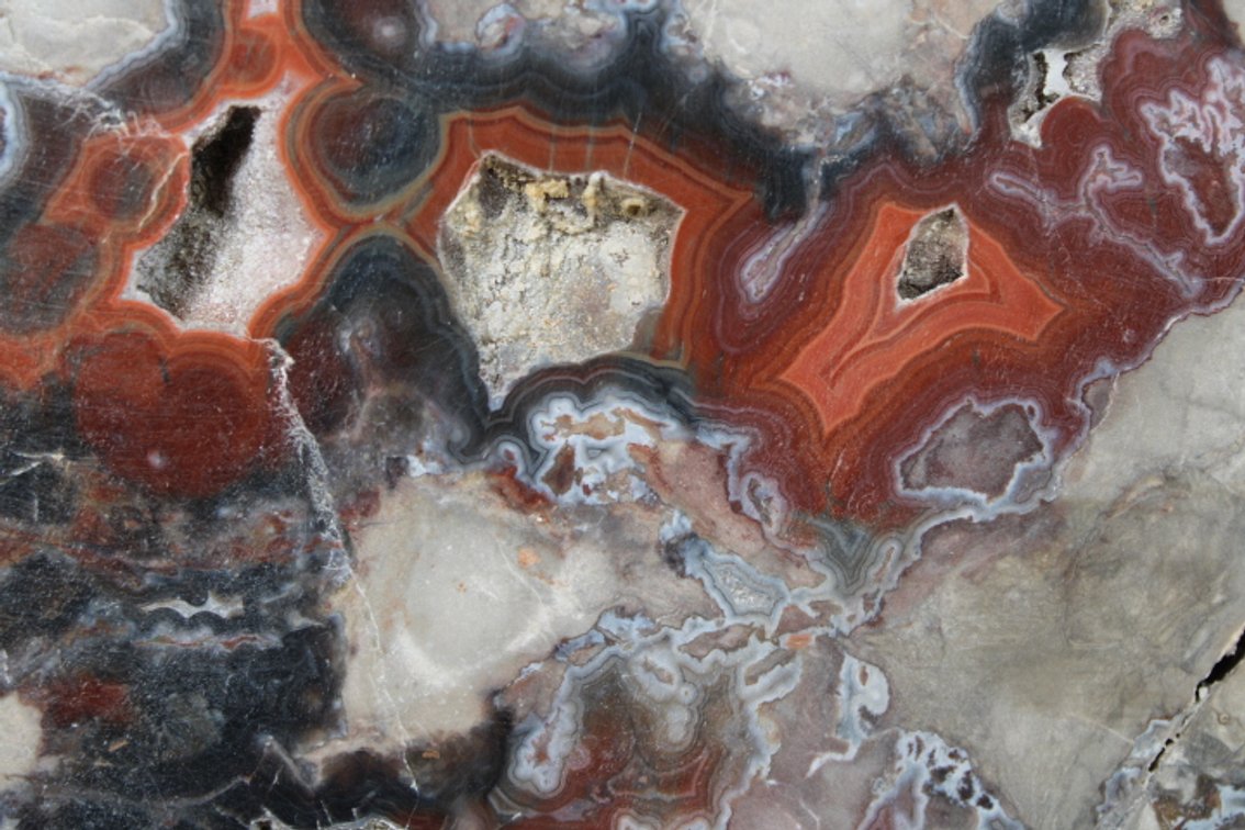 A 1 lb 15 oz piece of Teepee Canyon Agate that has been face polished