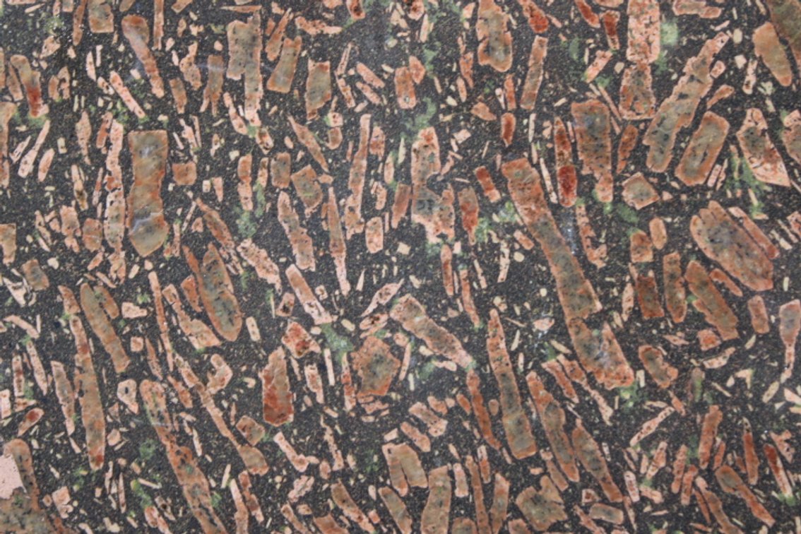 A 3 lb 15 oz piece of Porphyry