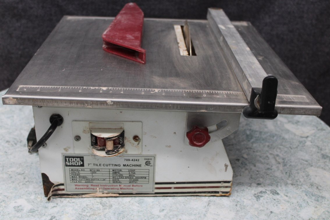 A used 7" tile saw with a diamond blade