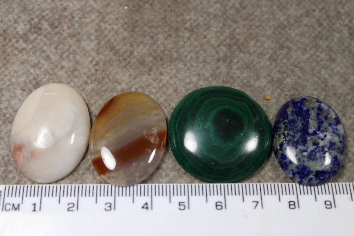 An assortment of four cabochons