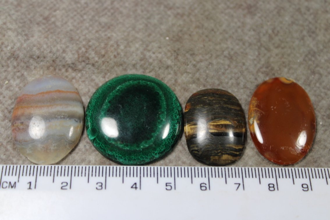 An assortment of four cabochons