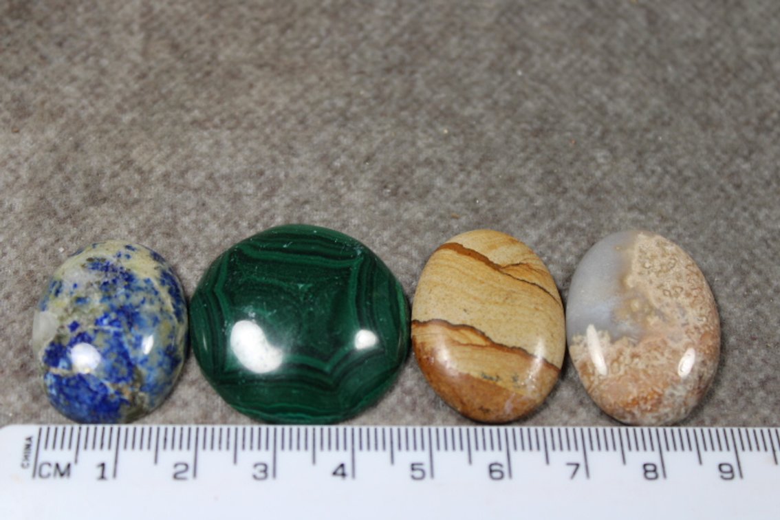 An assortment of four cabochons