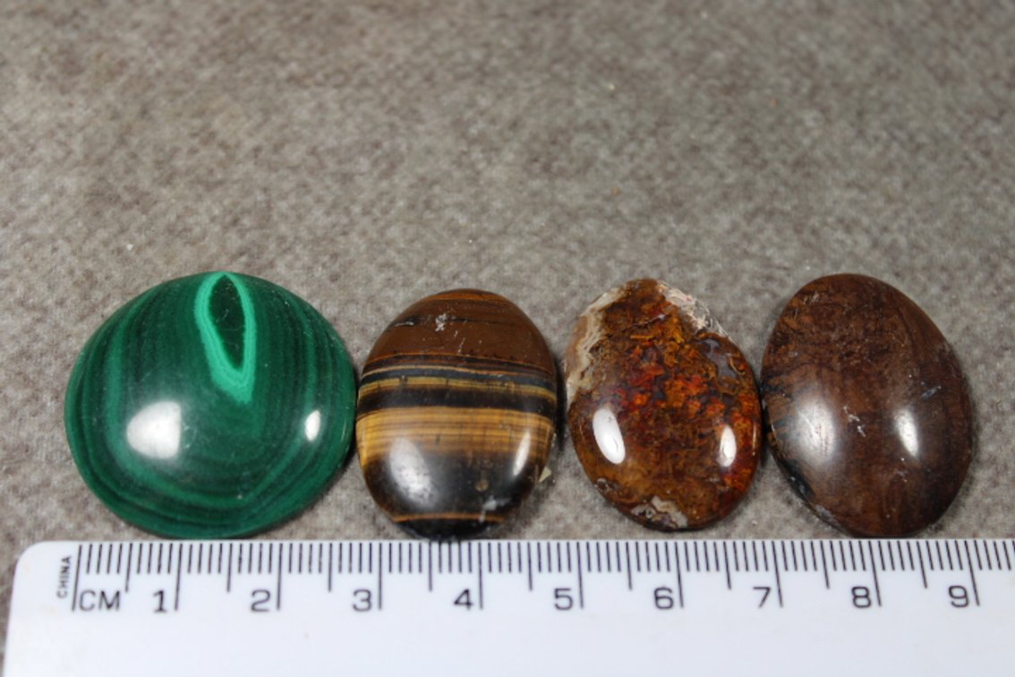 An assortment of four cabochons