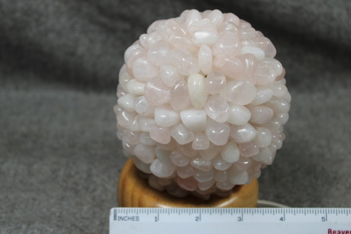 A Rose Quartz lamp with light and cord included