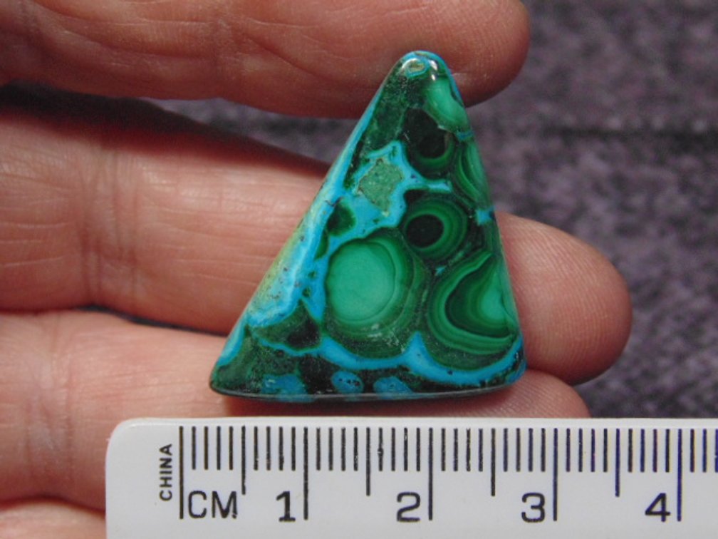 A freeform Malachite/Chrysocolla cab, weighs 6.6 grams