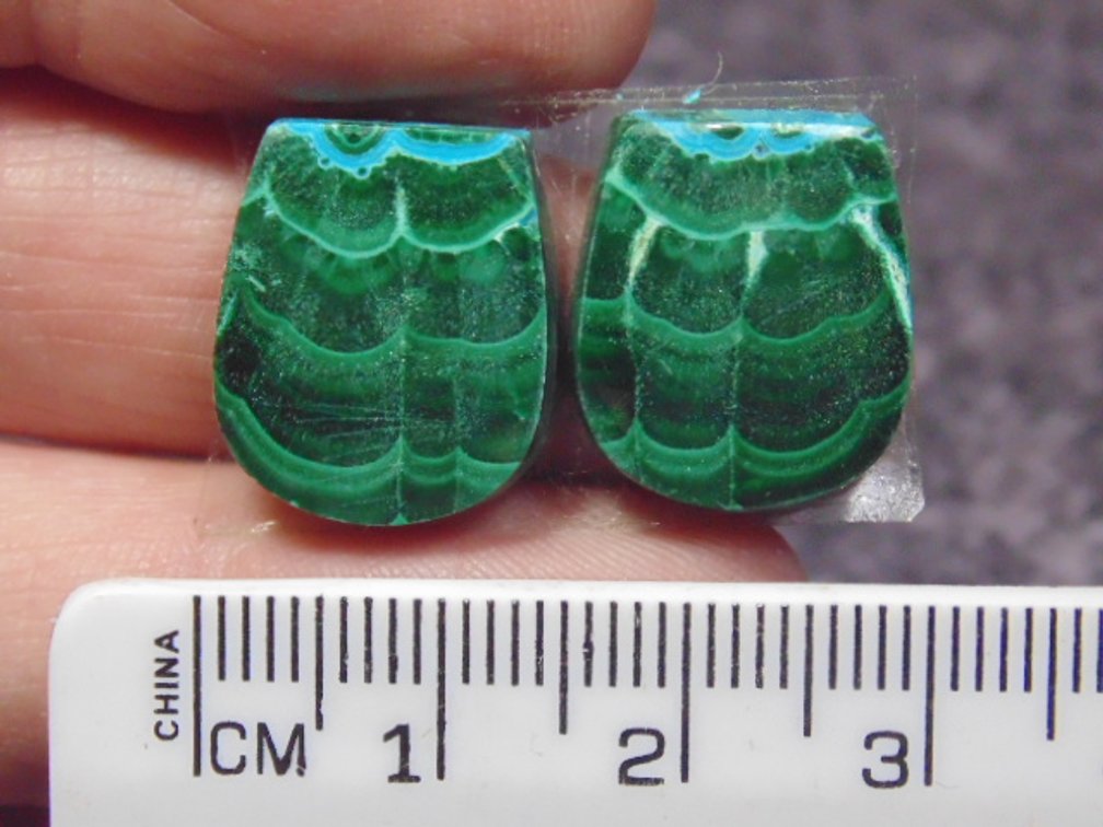 A pair of matching tongue shaped Malachite/Chrysocolla cabs, weighs 5.6 grams