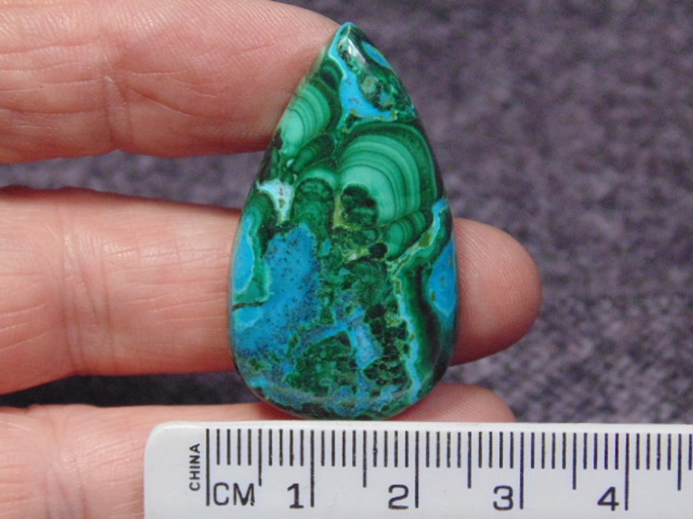 A teardrop Malachite/Chrysocolla cab, weighs 12.4 grams