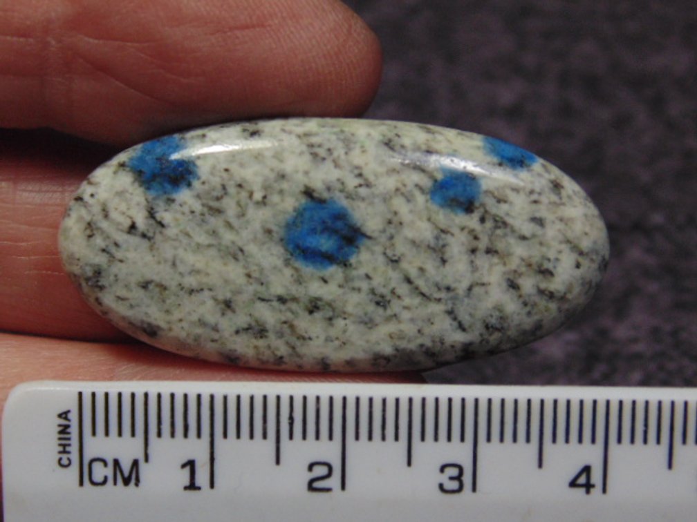 A oval K2 cab, weighs 7.8 grams