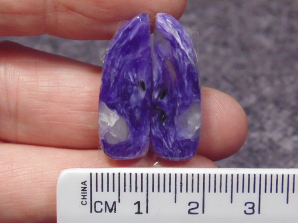 A pair of matching freeform Lepidolite cabs, weighs 4.4 grams
