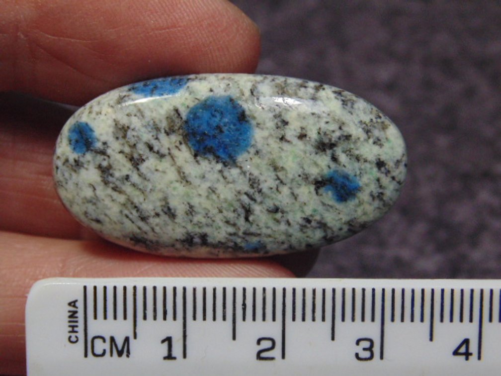 A oval K2 cab, weighs 7.8 grams