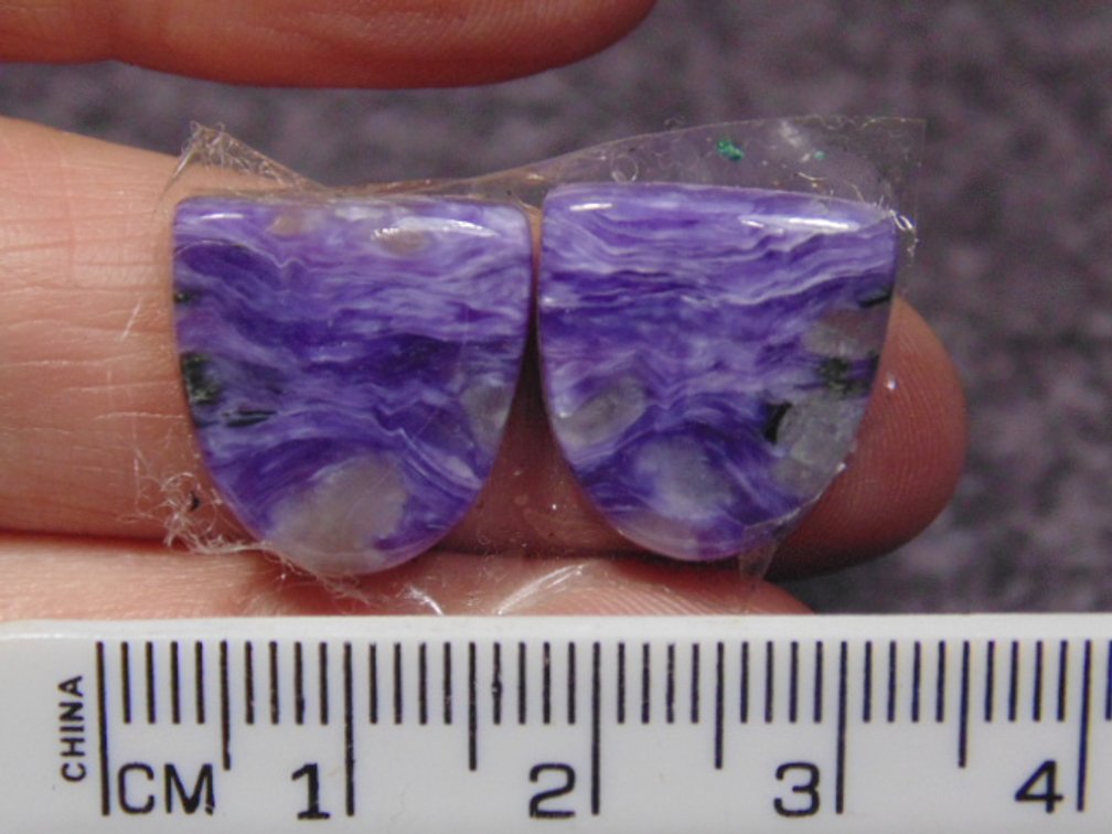 A pair of matching tongue shaped Lepidolite cabs, weighs 4.2 grams