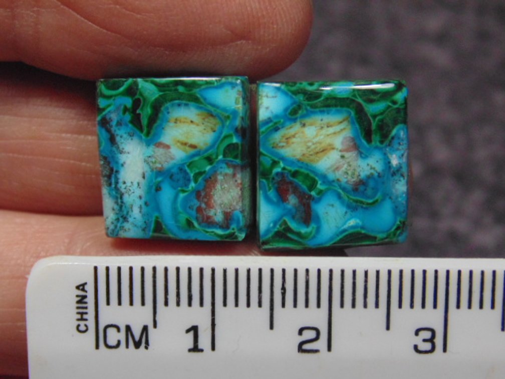 A pair of matching square shaped Malachite/Chrysocolla cabs, weighs 5 grams