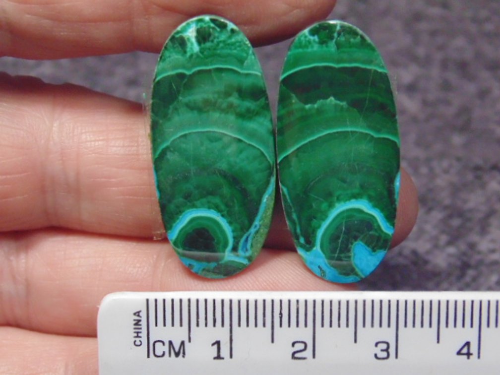 A pair of matching oval Malachite/Chrysocolla cabs, weighs 10.8 grams