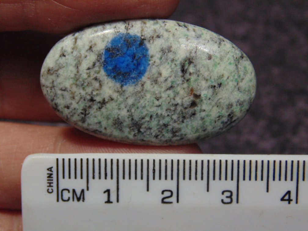 A oval K2 cab, weighs 7.9 grams