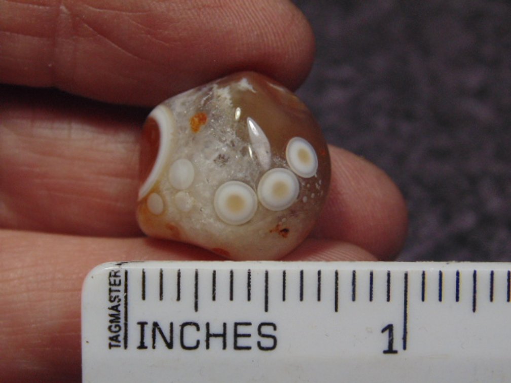 A polished Lake Superior Eye Agate, weighs 6.3 grams