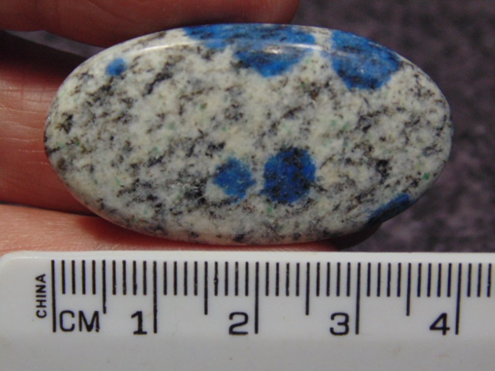 A oval K2 cab, weighs 8.8 grams