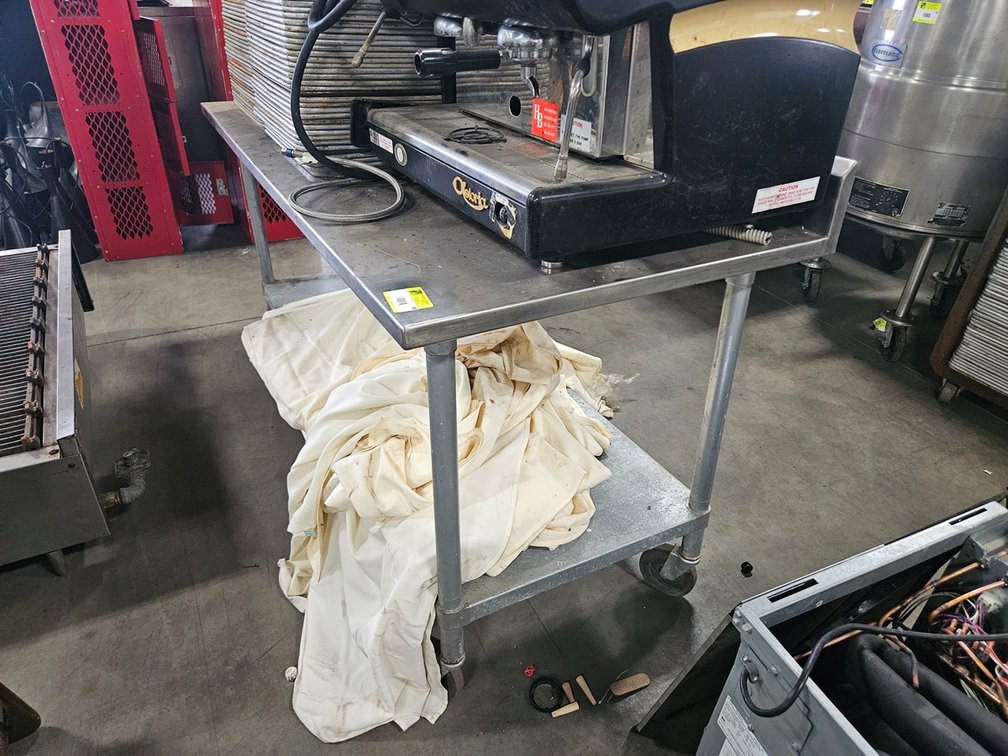 SS Table with Undershelf and Backsplash on Wheels (2 broken), 72"x30"x34"