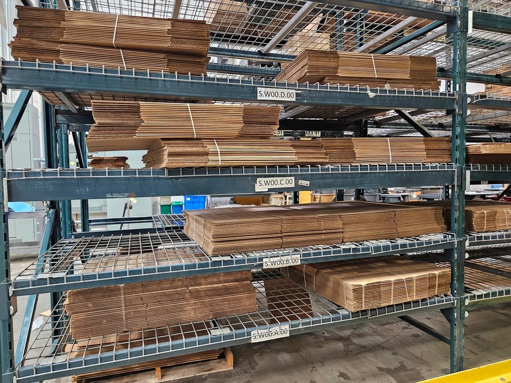 Assorted Cardboard Boxes in Section