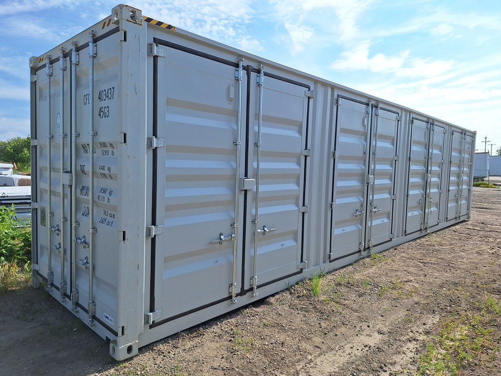 High Cube 40' Container, Four Doors. Details: Four Side Doors, One End Door, Lock Box, Side Forklift Pockets. Measures 8' Wide, 40' Long, 113" Tall.  Side Door Opening Measurement: 92" W x 100" T x 88" Deep, Weight 9,500lbs.