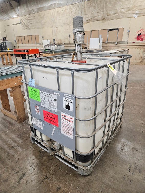 Pallet of Water Based Adhesive (Approx. 120 Gallons) with Graco Pump