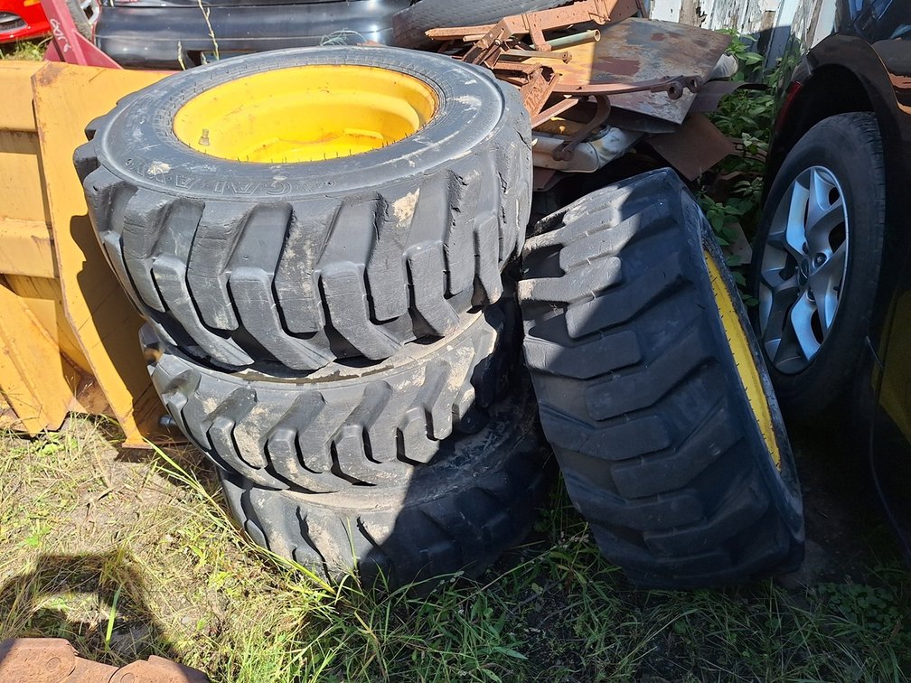 4 Galaxy XD2010 12x16.5 NHS 10-Ply Tubeless Skidsteer Tires with Rims