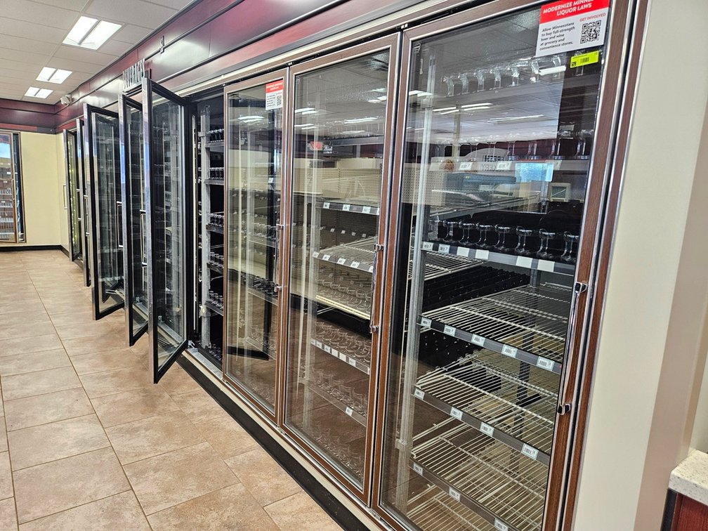 US Cooler 11 Glass Door Walk In Cooler, 2 Compartments, 2 Access Doors, Approx. 37'x10'x92", 3 Compressors 3 PH (2 Ground Level, 1 on Roof)