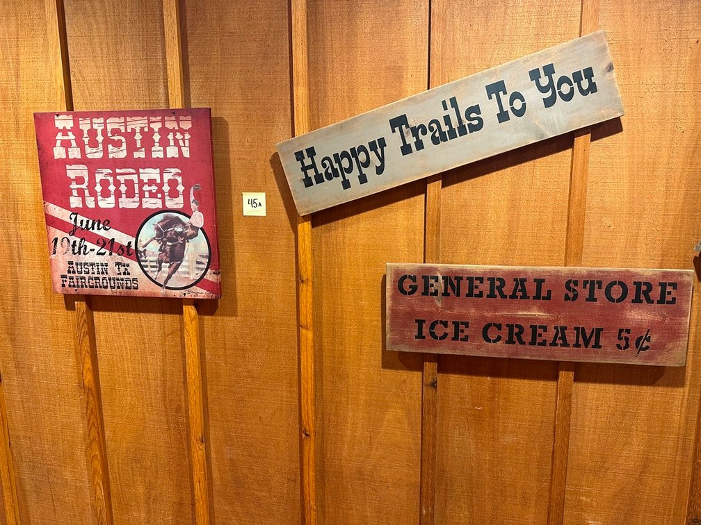 Austin Roseo & Happy Trails & General Store & Wild West Show & Our Family Rules signs